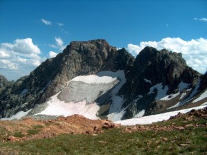 Rolling Thunder Mountain near Talus Lake is part of the Teton Range. The orange rock in the foreground is Webb Canyon gneiss, granite formed by decompression melting more than 2.6 billion years ago.