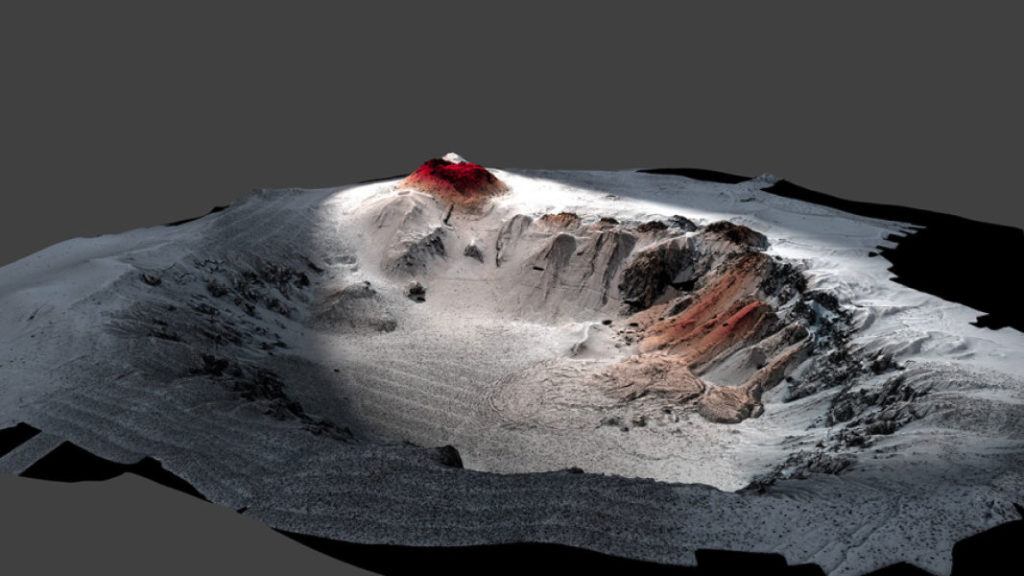 High-resolution seafloor topography of the Havre caldera mapped by the autonomous underwater vehicle (AUV) Sentry shows the new 2012 erupted lavas in red. The volcano is nearly a mile deep (1,519 meters). The top of the volcano is at 650 meters below sea level. Credit: Rebecca Carey, University of Tasmania, Adam Soule, WHOI, ©Woods Hole Oceanographic Institution